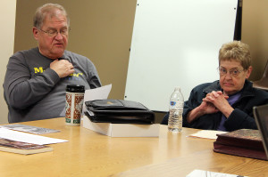 Terry Misfeldt, left, reads one of his stories to the group as Jeanne Connors listens during a meeting of the Shawano Area Writers. Misfeldt serves as the vice president of the Shawano Area Writers. (Photo by Lee Pulaski)